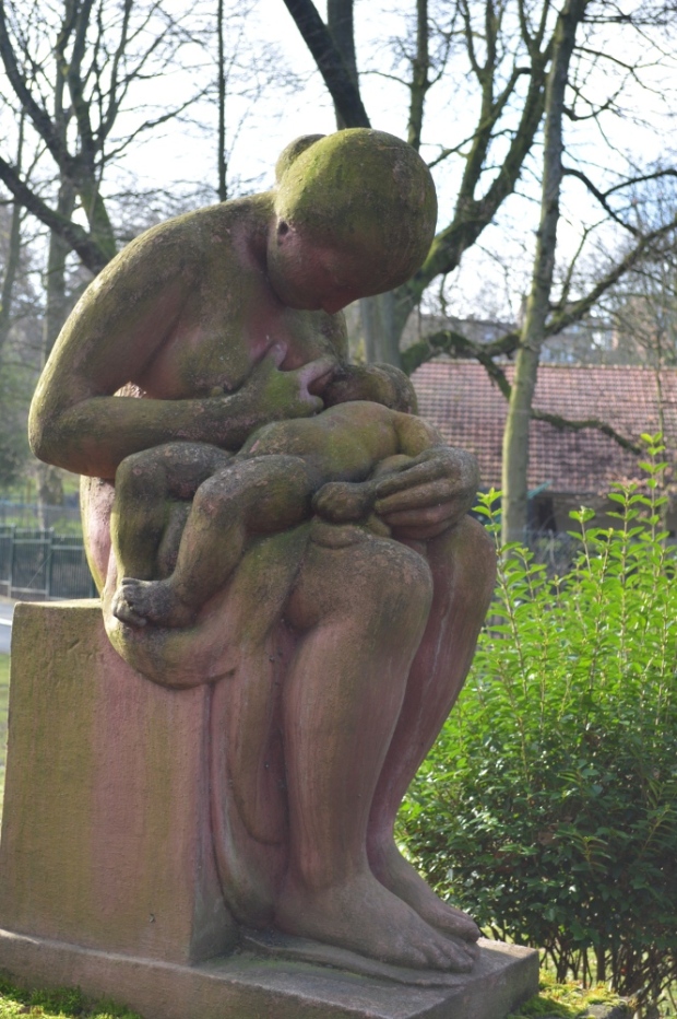 Statue of mother feeding baby